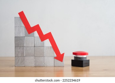Red graph bar chart falling down, stop reset button on wooden table with white wall background copy space. Stop recession economy, global world economic crisis, inflation or FED control interest rates