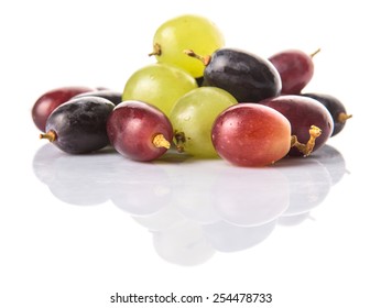 Red, Green And Black Grapes Fruits Over White Background