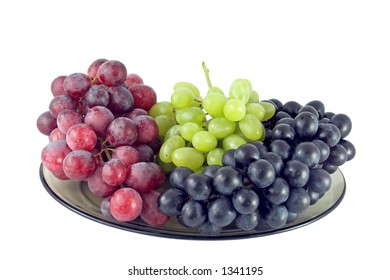 Red, Green And Black Grapes On White Background.