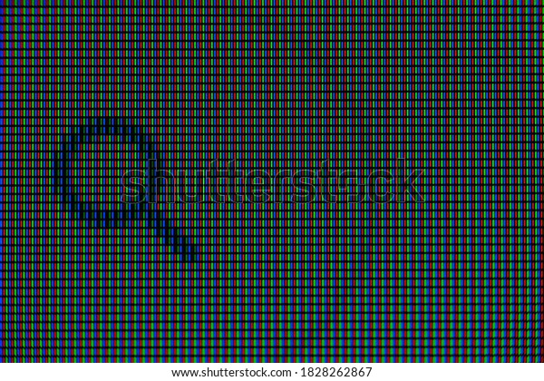 red\
green and blue pixels on the monitor matrix close\
up
