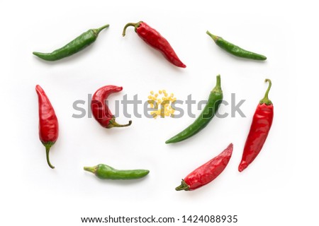 Red and Green hot chilli peppers with seed. Food background. Top view. 