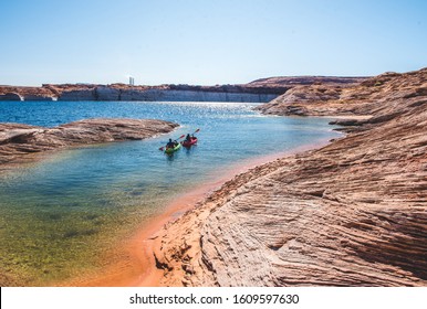 a red and a green kaiak on lake powell 