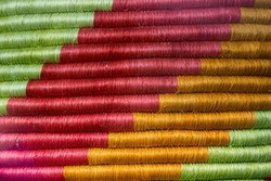 Red Green And Orange Woven Straw Fabric Background