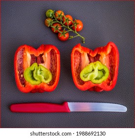 Red And Green Vegtables With Knife On A Grey Background