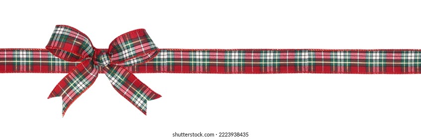 Red, green and white plaid Christmas gift bow and ribbon. Long border isolated on a white background. - Powered by Shutterstock