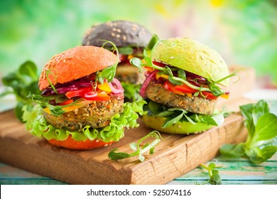 Red, Green,black Mini Burgers With Quinoa And Vegetables .