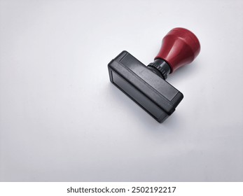 Red grip rubber stamp isolated on a white background.