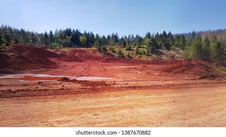 Red Ground Landscape Bauxite Mineral Aluminium Ore Near Mine In Milici Bosnia And Herzegovina 