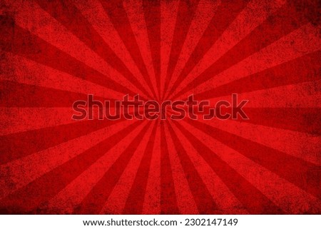 Red grunge background with sunburst 