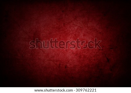 Red grunge textured wall, dark edges