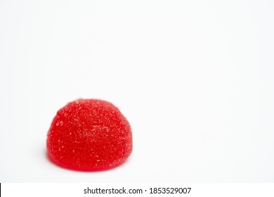 Red Gummy Vitamins On A White Background