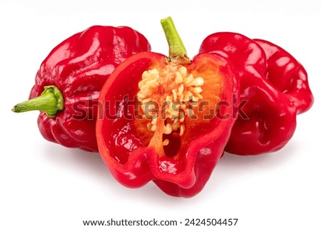 Red habanero pepper and habanero cross section on white background. 