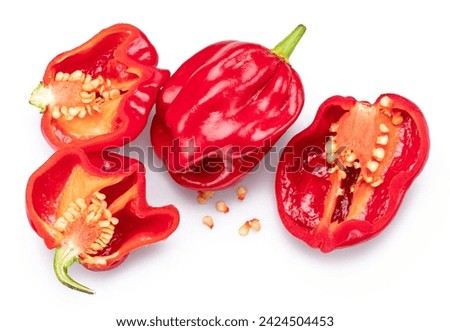 Red habanero peppers and habanero cross section on white background. 