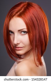 Red hair. Beautiful Woman with Short Hair
