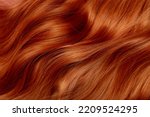 Red hair close-up as a background. Women