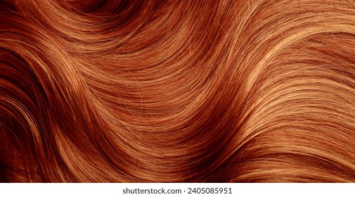 Red hair close-up as a background. Women's long orange hair. Beautifully styled wavy shiny curls. Hair coloring bright shades. Hairdressing procedures, extension. - Powered by Shutterstock