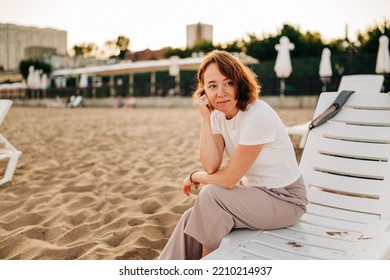 Red Hair Woman Close-up Fluttering In The Wind On The Beach In Summer Holidays, Rack Focus