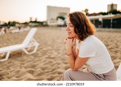 Red Hair Woman Close-up Fluttering In The Wind On The Beach In Summer Holidays, Rack Focus