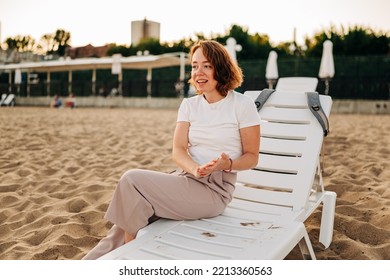 Red Hair Woman Close-up Fluttering In The Wind On The Beach In Summer Holidays, Rack Focus