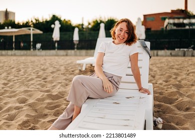 Red Hair Woman Close-up Fluttering In The Wind On The Beach In Summer Holidays, Rack Focus