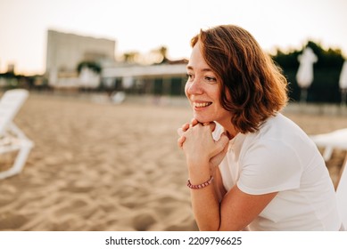 Red Hair Woman Lifestyle Portrait On The Beach At Summer