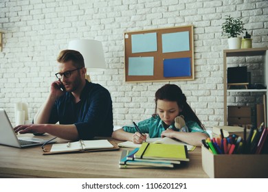 Red Haired Disgruntled Teen Girl Gets Angry With Father, Who Is Busy Doing Things. Fatherhood.