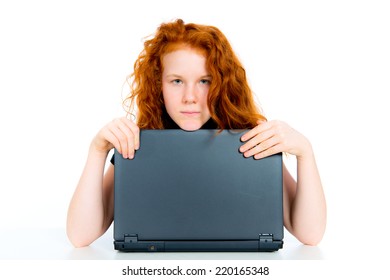 red haired girl with computer 