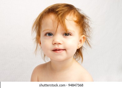 Red Haired Toddler With Messy Hair