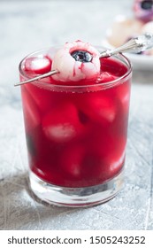 Red Halloween Cocktail With Lychee And Blueberry Eye