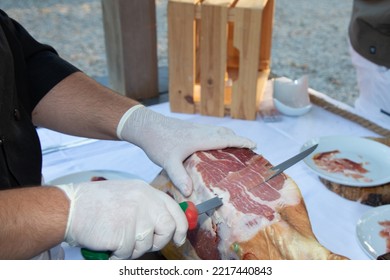 Red Ham Cut By Hand Chef Professional Cutter Carving Slices From Whole Bone In Serrano Ham