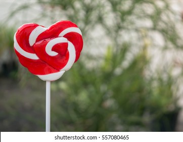 Red hart shape candy .