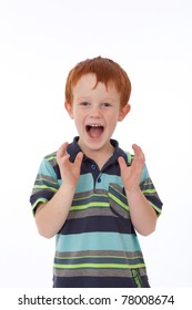 Red Head Boy With Freckles Looking Shocked And Surprised While Smiling And Holding Hands In Air