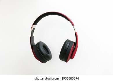 Red headphone isolate on white background. - Shutterstock ID 1935685894