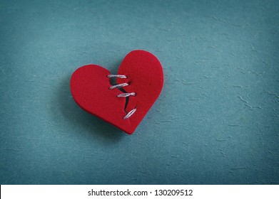 Red Heart, Broken With Threaded Stitches