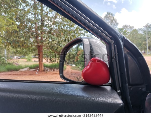 red heart with car\
door