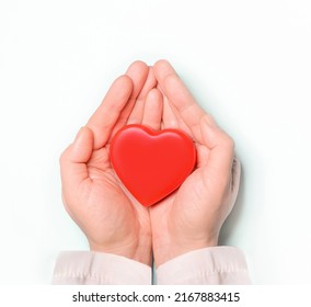 Red heart in Doctor 's hands on white background. Healthcare and hospital medical concept,organ donation concept.Symbolic of Valentine day.Heart day.?opy space.