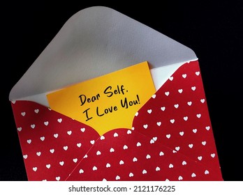Red Heart Envelope With Handwritten Card DEAR SELF, I LOVE YOU - Concept Of Single Person Writing Love Letter To Themselves On Valentines Day