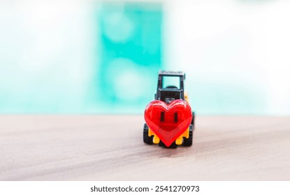 Red heart with forklift truck over blurred background, valentine background idea, love industry - Powered by Shutterstock