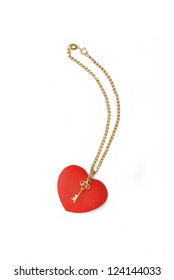 Red Heart With A Key On A Gold Chain On White Background