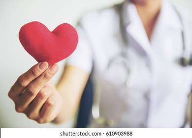 Red heart in nurse's hands. We care concepts. - Powered by Shutterstock