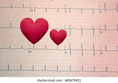 Red Heart On Echo Cardiogram Graph Background.