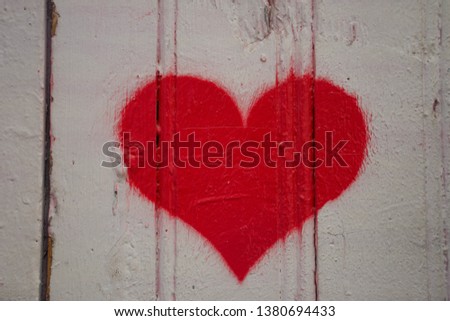 Similar – red heart sprayed on the house