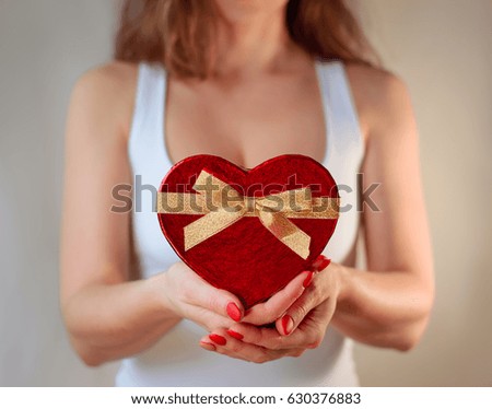 Red heart present woman hands holding - Valentine day romantic surprise