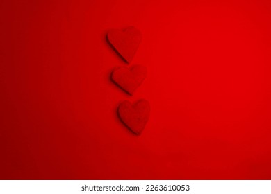 Red heart shape on red background. Symbol of love. Valentine Day