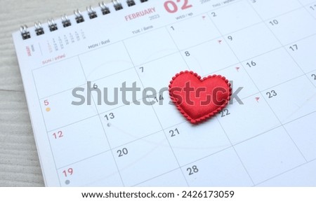 Red heart shape on the date of the 14th day in the calendar. ,marks a day of love, as red hearts adorn spaces, epitomizing Valentine's Day, a celebration of romance and romantic.
Valentine's Day  Stock photo © 