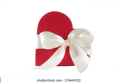 Red Heart Shaped Gift Box Over White Background