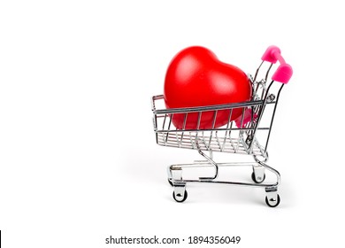 Red Heart in shopping cart or trolley Isolated On White Background.Blood pressure control-Health care concept.Valentine Concept.