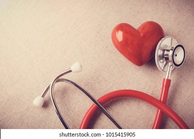 red heart with stethoscope, heart health,  health insurance concept, world health day, doctor day, world hypertension day