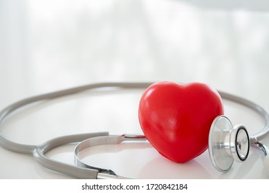 Red Heart With Stethoscope At Hospital. Cardiovascular And Heart Health Care Concept.