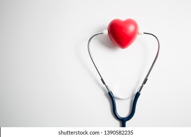 Red Heart With Stethoscope On White Background, Heart Health, Health Insurance Concept, World Health Day.